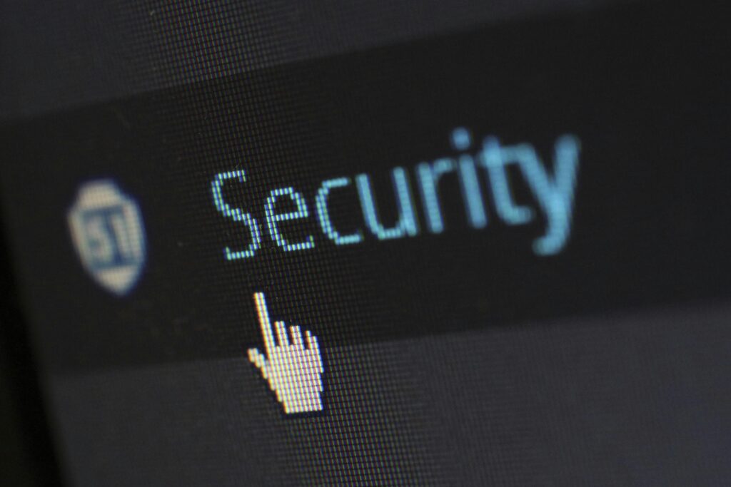 A cursor pointing to a security icon on a digital screen